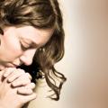 Troubled girl praying